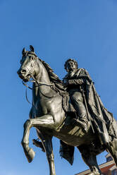 Germany, Thuringia, Weimar, Equestrian statue of Grand Duke Carl August against blue sky - EGBF00692