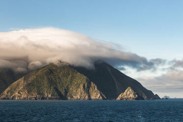 Thick clouds shrouding coastal mountains of Marlborough Sounds - WVF01982