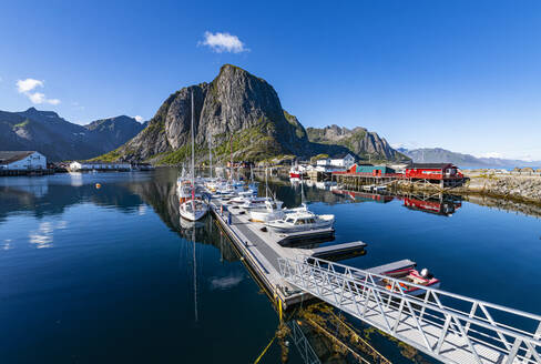 Fishing boats by pier at Reine, Lofoten, Norway - RUNF04428