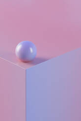 Three dimensional render of purple sphere lying on top of purple edge - JPSF00211