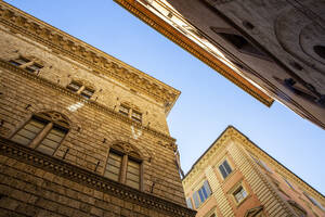 Italy, Tuscany, Siena, Low angle view of Palazzo Piccolomini - MAMF01834