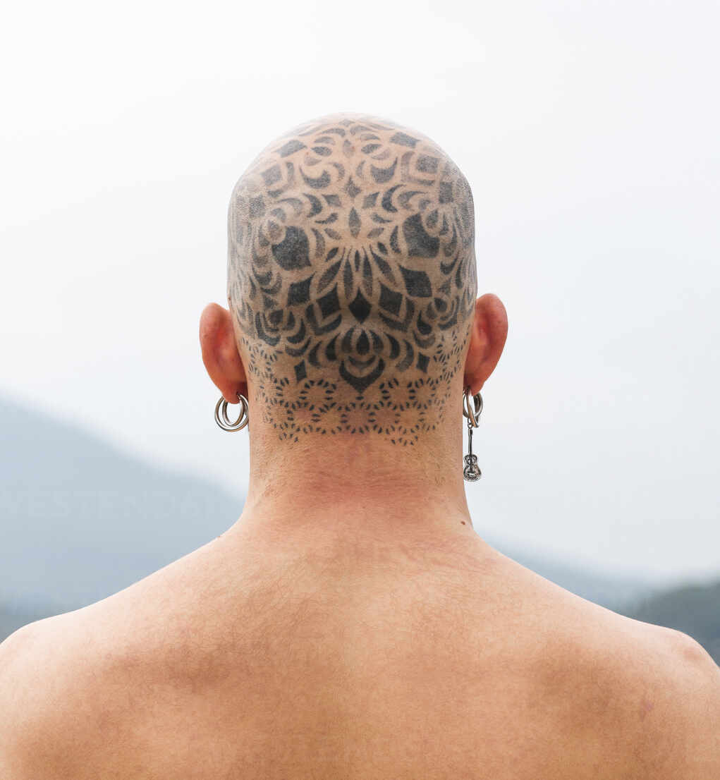 Profile View Of Young Man With Tattoos On His Neck High-Res Stock Photo -  Getty Images