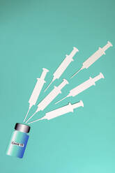 2D paper cutouts of blank syringes and bottle of vaccine - AWDF00763