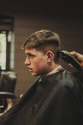 Young man in salon for haircut - ACPF01247