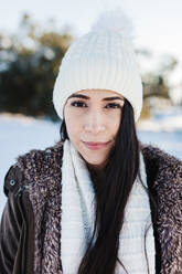 Beautiful woman wearing knit hat and warm clothing - MRRF01250