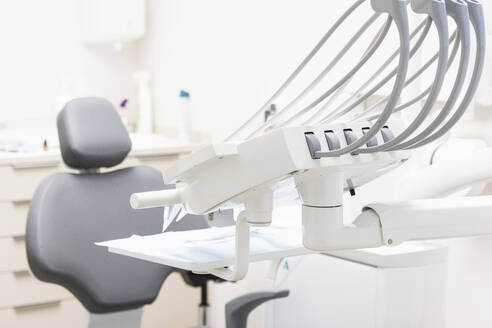 Dental machine and dentist's chair at clinic - PNAF01928