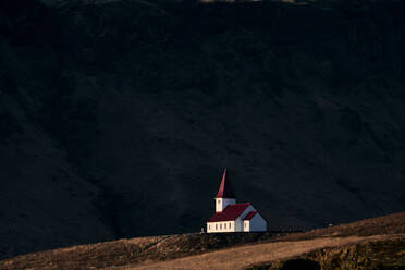 Church near dark mountain slope - CAVF94129