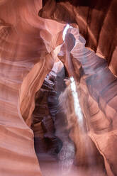 Picturesque landscape of narrow and deep slot canyon illuminated by daylight placed in Antelope Canyon in America - ADSF24925