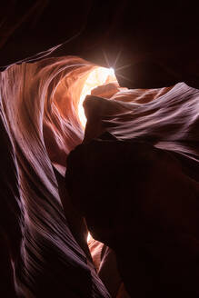 Picturesque landscape of narrow and deep slot canyon illuminated by daylight placed in Antelope Canyon in America - ADSF24928