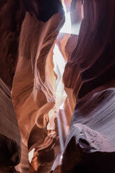 Picturesque landscape of narrow and deep slot canyon illuminated by daylight placed in Antelope Canyon in America - ADSF24931