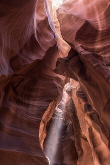 Picturesque landscape of narrow and deep slot canyon illuminated by daylight placed in Antelope Canyon in America - ADSF24933