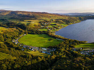 UK, Scotland, Aerial view of village on shore of Uig Bay - RUNF04557