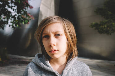 Close Up Portrait of Boy with Grey Hoodie - CAVF94344