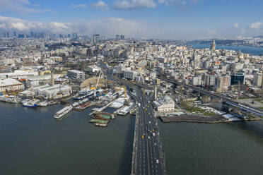 Turkey, Istanbul, Aerial view of Ataturk Bridge with city downtown in background - TAMF03119