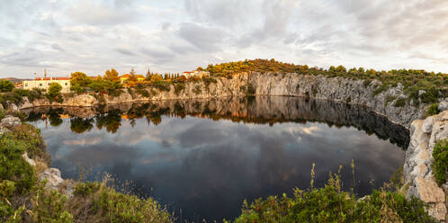 Scenic view of lake amidst rock formation, Lake Dragon's Eye, Rogoznica, Croatia - MAMF01889