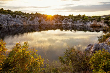 Idyllic Lake Dragon's Eye during sunset, Rogoznica, Croatia - MAMF01897