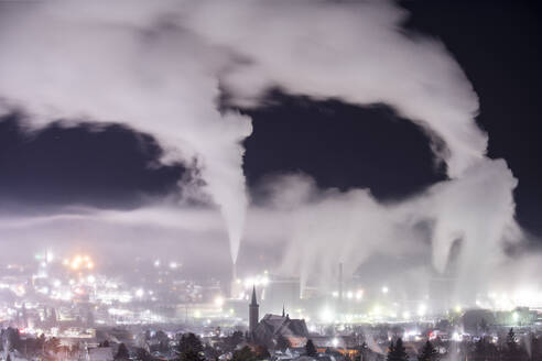 Huge Smokestacks and Foggy Cityscape at Night - CAVF94486