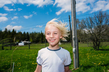 Canada, Ontario, Kingston, Portrait of boy in field - ISF24816