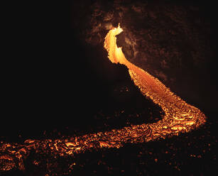 From above the magma of the volcano runs in the form of rivers of lava across the ground in Iceland - ADSF25612