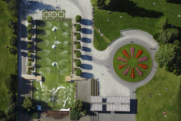 UK, London, Overhead view of lawn with sprinklers at Battersea Park - ISF24849