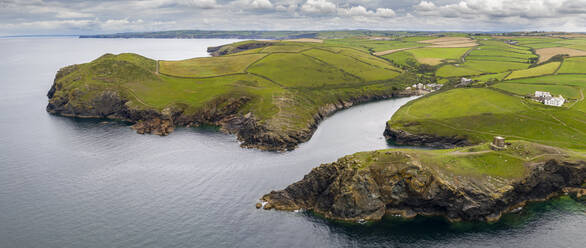 Aerial vista of Port Quin on the North Cornish coast, Cornwall, England, United Kingdom, Europe - RHPLF19952