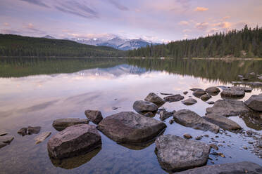 Sunrise on a beautiful reflective lake in the Canadian Rockies, Jasper National Park, UNESCO World Heritage Site, Alberta, Canada, North America - RHPLF19970