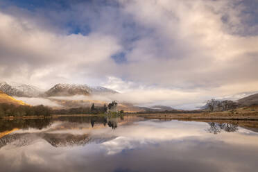 Kilchurn Castle reflected in Loch Awe at dawn in winter, Highlands, Scotland, United Kingdom, Europe - RHPLF19980