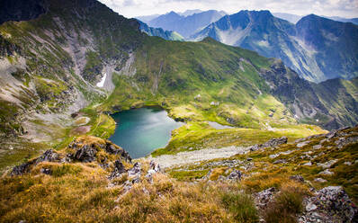 Lake Capra in the Fagaras Mountains in central Romania, Cartisoara, Sibiu County, Romania, Europe - RHPLF20224