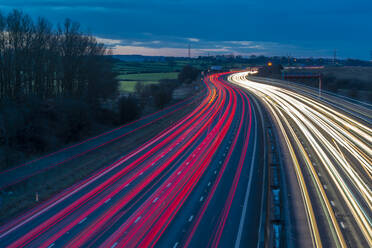 View of traffic trail lights on M1 motorway near Chesterfield, Derbyshire, England, United Kingdom, Europe - RHPLF20305