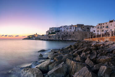 Sunrise over Vieste old town on headland by the sea, Foggia province, Gargano National Park, Apulia, Italy, Europe - RHPLF20310