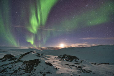 Aurora Borealis (Northern Lights) over the mountains, Finnmark, Norway, Scandinavia, Europe - RHPLF20331