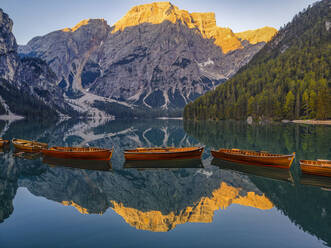 Lake Braies, Croda del Becco reflected in Lake Braies at sunrise, South Tyrol, Alto Adige, Dolomites, Italy, Europe - RHPLF20333