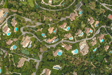 Aerial view of luxury villas with pool in Saint Tropez, France. - AAEF09567