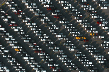 Aerial view of vehicles closely parked at a manufacturing site, Bruges, Belgium. - AAEF09648