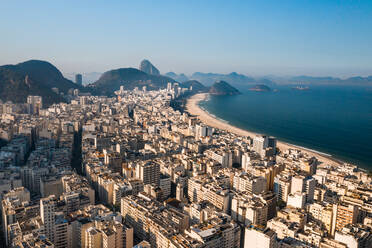 Aerial View Of Buildings In Residential Area Along Copacabana Beachfront With Sugarloaf Mountain In Distance, Rio De Janeiro, Brazil - AAEF09666