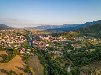 Aerial view of trees and little house in Polla, a little town in Parco Nazionale del Cilento e Vallo di Diano, Campania, Italy. - AAEF10164