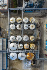 Aerial view of a petrol chemical processing plant and storage facilities. - AAEF10185