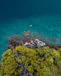 Aerial view of people on kayak in archipelago of El Nido, the Philippines. - AAEF11227
