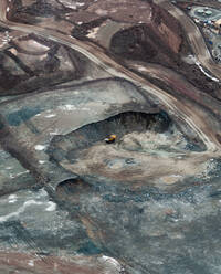 Aerial view of industrial mining operations and machinery with salt lake textures on Lake Lefroy, Western Australia - AAEF11646