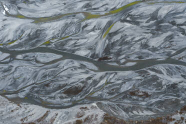 Aerial view of snow melting along Spiti river near Kaza township, Himachal Pradesh, India. - AAEF11687