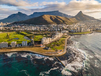 Aerial view of Lion‚Äôs Head, Green Point Stadium, Table Mountain and Mouille Point Lighthouse in summer from Atlantic Seaboard Sea Point Cape Town, South Africa - AAEF11699