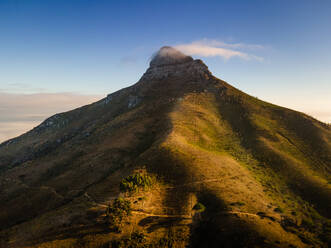 Aerial view of Lion‚Äôs Head mountain with fog at top at sunrise Cape Town, South Africa - AAEF11723