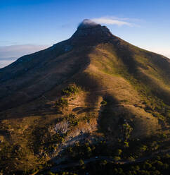 Aerial view of Lion‚Äôs Head mountain with fog at top at sunrise Cape Town, South Africa - AAEF11724
