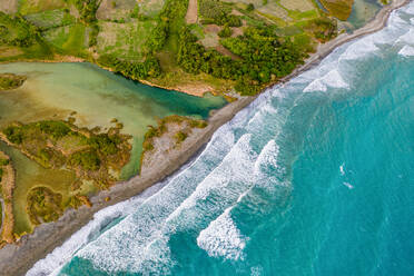 Aerial view of strong waves at Patos Beach at the mouth of the Rio Nizao during the golden hour, Nizao, Peravia, Dominican Republic - AAEF11878