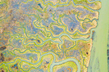 Aerial view of the abstract pattern made by Scheldt river estuaries near Belgium and The Netherlands border, Nieuw-Namen, Zeeland, The Netherlands. - AAEF12273