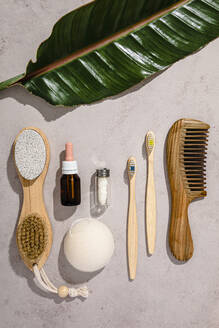 Collection of eco-friendly personal care objects flat laid against white background - FLMF00624