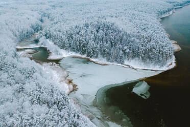 Aerial view of frozen bay nature landscape during winter time in Kaunas, Lithuania - AAEF12752