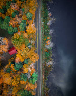 Vermont , USA - 13 October 2019 : Aerial View of a lonely house by the colorful trees during season of Fall in Vermont, USA - AAEF13002