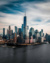 Aerial view of the skyline in New York City with One World Trade Center in Frame seen from the Hoboken Station in New Jersey, USA. - AAEF13007