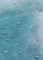 Aerial view of several boats anchored along the Atlantic Ocean shoreline in Miami Beach, Florida, United States. - AAEF13110